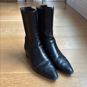 The Row Black Leather Ankle Boots.